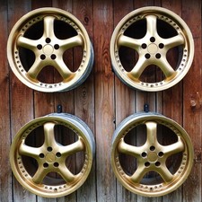 4x Intra 7117B Alufelgen gold - 7x17  5x100  ET37 - VW Golf Audi Seat Leon Skoda