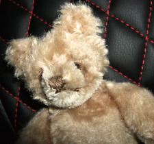 Teddy von Steiff mit Knopf im