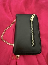 H&M CLUTCH LEDER LIMITED