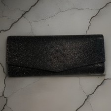 Schwarze Glitzerclutch Handtasche mit einer Silberfarbenen Metallkette