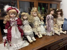 7 Porzellan Puppen Konvolut