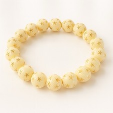 Armband Creme mit gold Sternen