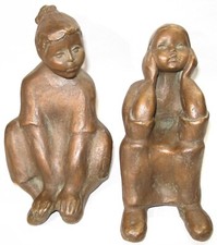 Achatit Figuren zwei sitzende