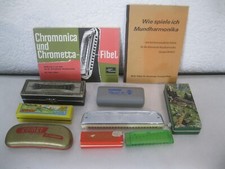 8x Mundharmonika + 2 Bücher