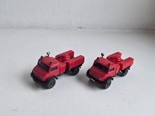 WIKING 2x Feuerwehr UNIMOG Löschfahrzeug