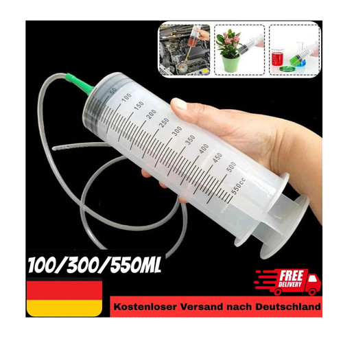 Large syringe with hose