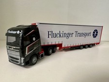 Herpa/AWM Volvo FH Tieflader Planen Sattelzug „FLUCKINGER“ (AT)
