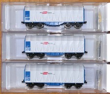 Roco 67155   ÖBB Rail Cargo Austria, Set mit drei Schiebeplanenwagen, Epoche VI