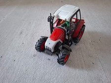Traktor Lindner Geotrac 100, rot, 1:27 mit Fahrerfigur
