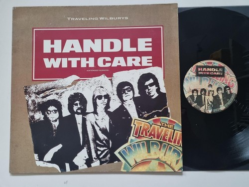 Traveling wilburys handle - traveling,