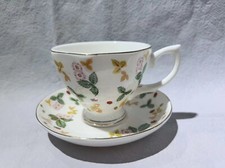 Porcelain Tea Cup and Saucer