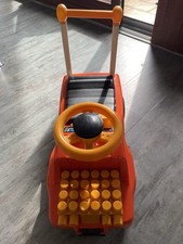 KETTLER Rutschauto 80er Jahre mit Bausteinen unter dem Sitz