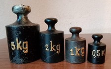 4 alte Waage-Gewichte