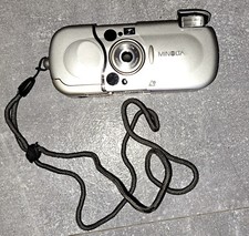 Motorola Handy  +  Minolta Kamera zahlreiches Zubehör
