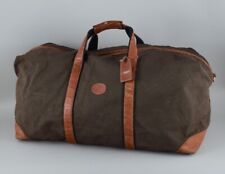 Longchamp, große Reisetasche aus Canvas und genarbtem Leder. Ende 1900.