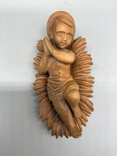 Jesuskind handgeschnitzte Figur aus Holz kleiner betender Junge in der Wiege