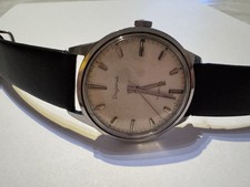 Dugena Tropica – Vintage Handaufzug Armbanduhr, Edelstahl, Swiss Made