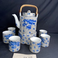 Teeservice Teekanne Becher Stövchen grau blau Porzellan China