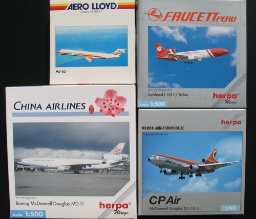Herpa wings 83 lockheed - 4x, md-83