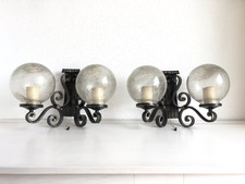 2 Schmiedeeiserne Wandlampen