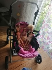 Puppenwagen Buggy mit 3 Puppen