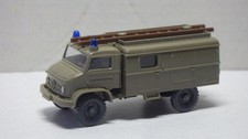 Unimog S404 Katastrophenschutz  a. Pack.  v.  Wiking 1:87