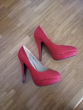 Rot glitzernde High Heels mit