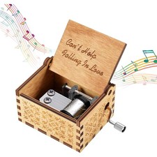 Handgeschnitzte Holzspieluhr