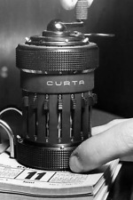 Rechenmaschine Curta Firma