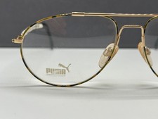 Puma Brille Herren Gold braun