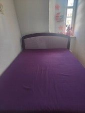 Lila Polsterbett 140 x 200 mit großem Bettkasten