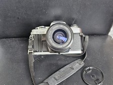 MINOLTA x - 300 with COSINA