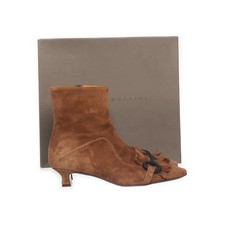 Andrea Puccini, Stiefeletten