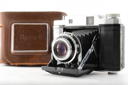 Neuwertige analoge - n,
