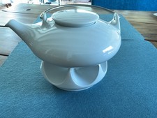 Teekanne auf Stövchen