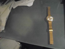 Uhr Herren goldfarben, Marke