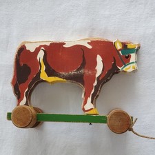 Antikspielzeug Nachziehtier aus Holz, dargestellt ist eine Kuh ca. 17 x 12 x 6,5