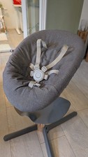 Stokke Nomi Newborn Aufsatz – grau, wie neu