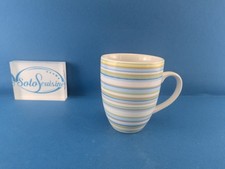 TCM, Tchibo grün/blau/gelb gestreift Kaffeebecher
