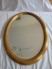 Spiegel mit Goldrahmen oval