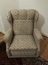 Antiker Ohrensessel mit