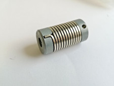 1 x Federkupplung / Wellenkupplung  - Länge 51mm  - Ø 26mm | 10mm x 10mm Welle