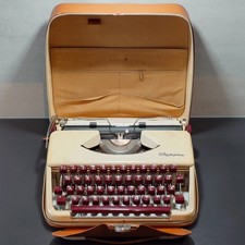 Reise-Schreibmaschine Olympia “SF“ - Beige mit dunkelroten Tasten & Leder-Tasche
