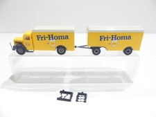 Brekina 1/87 MAN Kofferhängerzug Fri-Homa in VP A5741