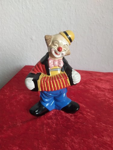 Clown figur mit akkordeon - mit,