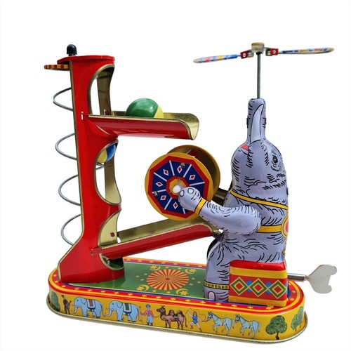 Blechspielzeug spielender - *,