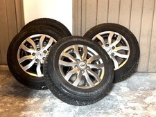 VW CADDY 2013 Vier Bridgestone all Wetter Reifen mit Alu Felgen 195.65/R15