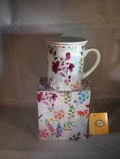 Teetasse mit Sieb und Deckel