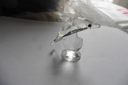Geschnitzte delfin figur aus - geschnitzte,