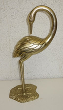 großer messingfarbener Reiher